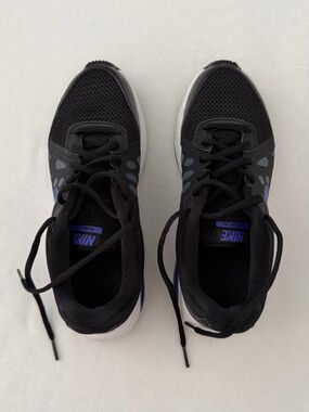 Nike Black Athletic Sneakers with Blue Accents